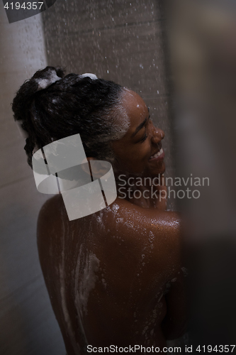 Image of African American woman in the shower