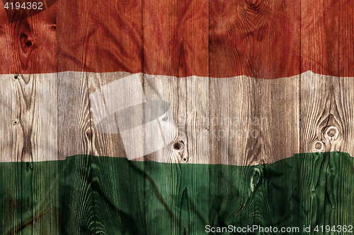Image of National flag of Hungary, wooden background