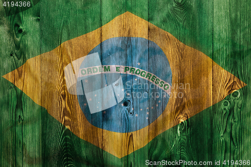 Image of National flag of Brazil, wooden background