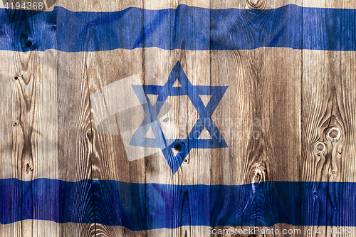 Image of National flag of Israel, wooden background