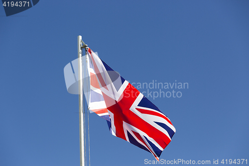 Image of UK flag on a flagpole