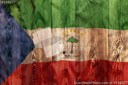 Image of National flag of Equatorial Guinea, wooden background