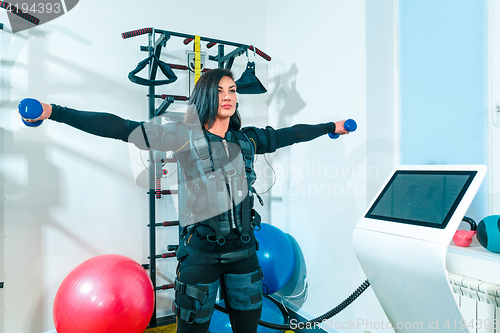 Image of The female athlete doing they exercise in a ems fitness studio