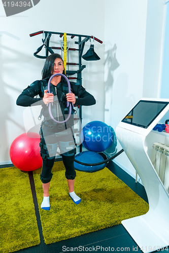 Image of The female athlete doing they exercise in a ems fitness studio