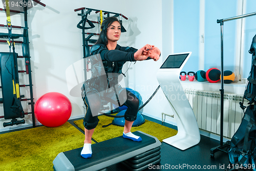 Image of The female athlete doing they exercise in a ems fitness studio