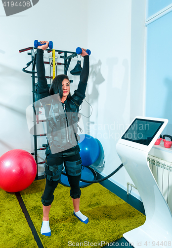 Image of The female athlete doing they exercise in a ems fitness studio