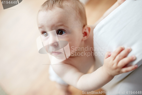 Image of close up of happy little baby boy or girl at home