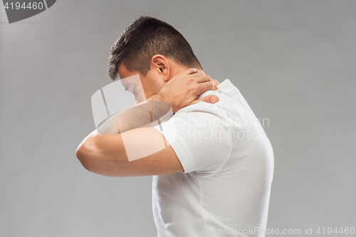 Image of close up of man suffering from neck pain