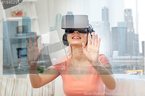 Image of woman in virtual reality headset with city