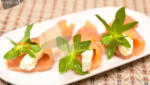 Image of appetizers with red fish