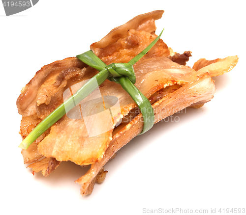Image of fried bacon on white