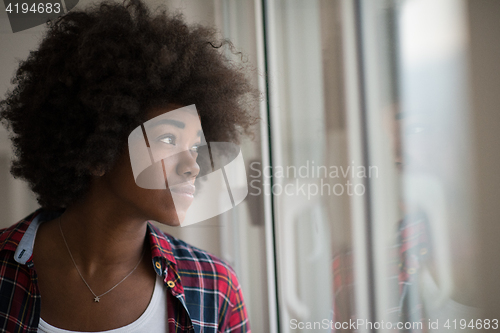Image of portrait of a young beautiful black woman