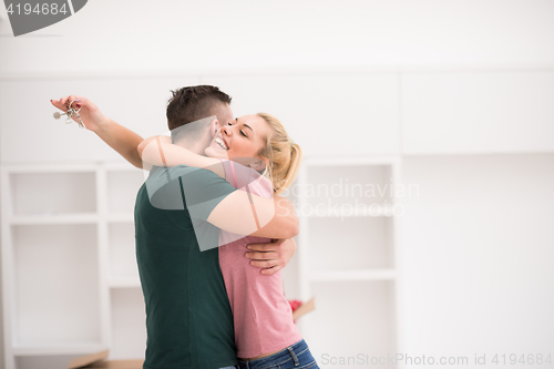 Image of happy Young couple moving in new house