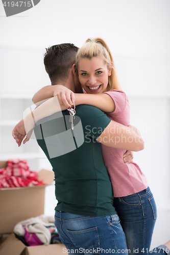 Image of happy Young couple moving in new house