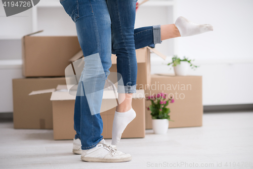 Image of happy Young couple moving in new house