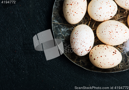 Image of raw chicken eggs