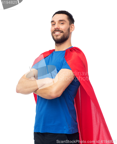 Image of happy man in red superhero cape