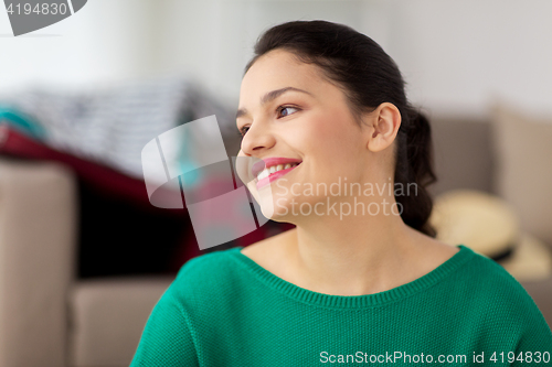 Image of happy young woman portrait at home