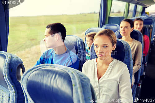 Image of group of passengers or tourists in travel bus