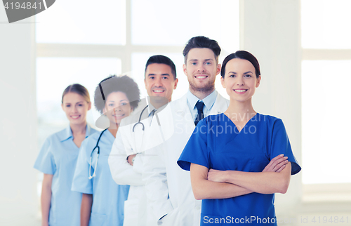 Image of group of happy doctors at hospital