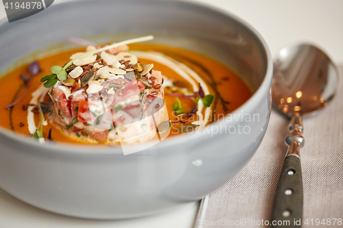 Image of close up of vegetable pumpkin-ginger soup in bowl