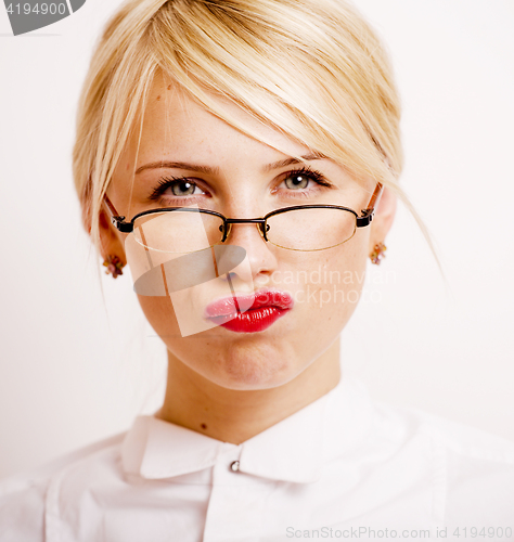 Image of very emotional businesswoman in glasses, blond hair on white background. teacher hands up posing isolated. pointing gesturing, lifestyle people concept 