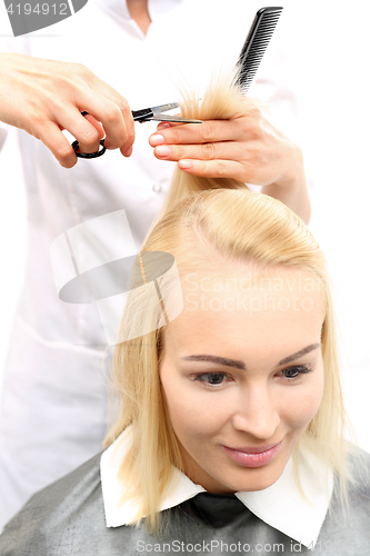 Image of haircut bangs , woman at the hairdresser 