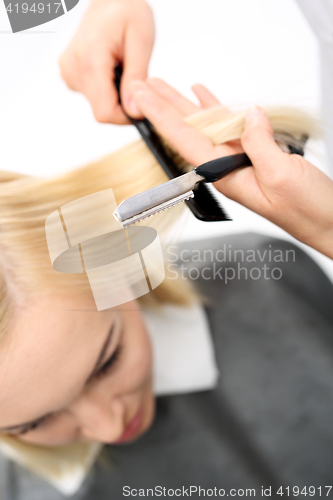 Image of Haircut  chinese knife Chinese knife  At the hairdresser, hair cut with a razor