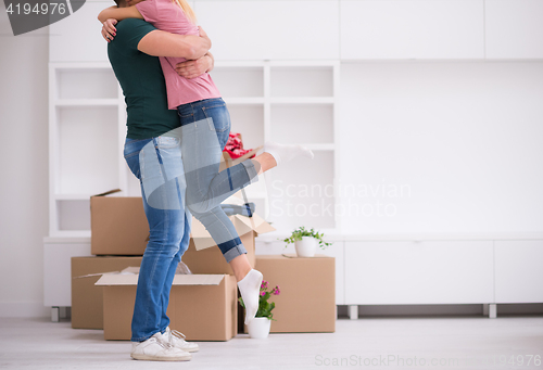 Image of happy Young couple moving in new house