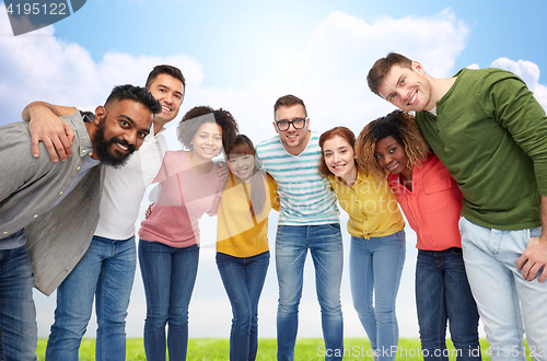 Image of international group of happy people hugging