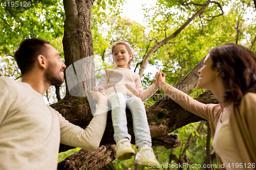 Image of happy family in summer park having fun