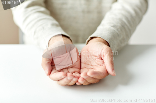 Image of close up of empty senior man hands