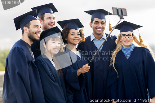 Image of students or bachelors taking selfie by smartphone