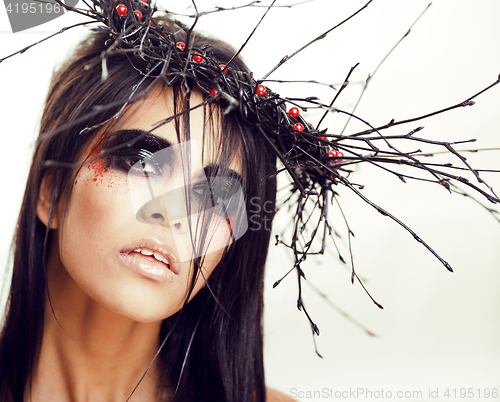 Image of pretty brunette woman with make up like demon at halloween, isolated on white background closeup