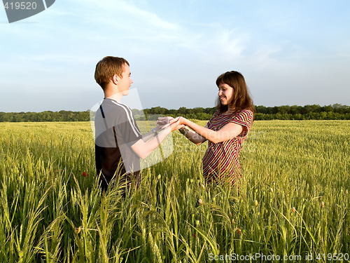 Image of Young Couple in Field