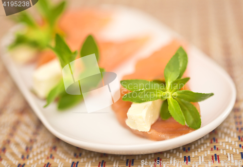 Image of appetizers with red fish