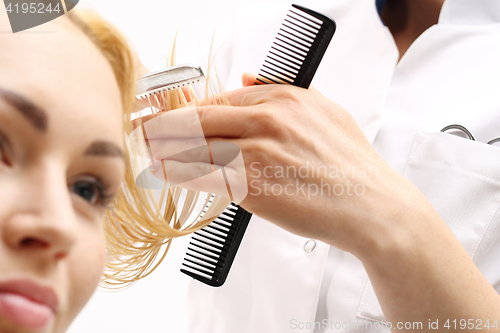 Image of haircut bangs , woman at the hairdresser 