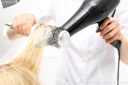 Image of Hairdresser  dry hair