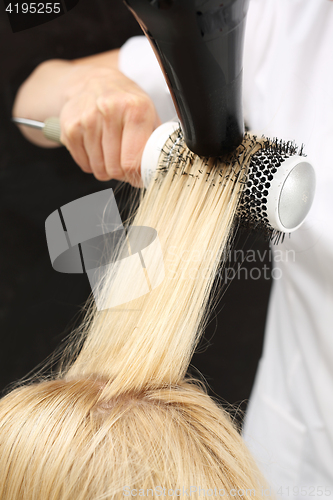 Image of Hairdresser  dry hair Modeling hair brush Hair styling brush