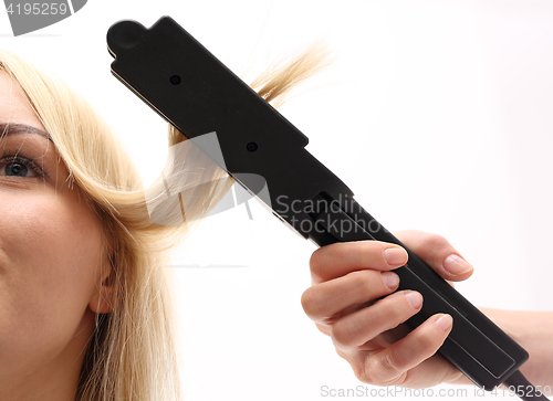 Image of Straightening. Iron barbershops, hair straightening.