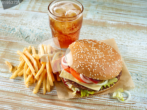 Image of fresh tasty burger and cola