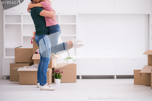 Image of happy Young couple moving in new house