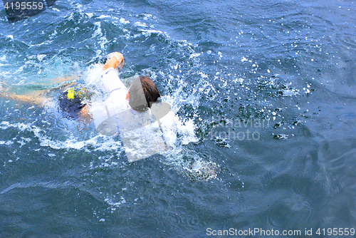 Image of Boy swimming.