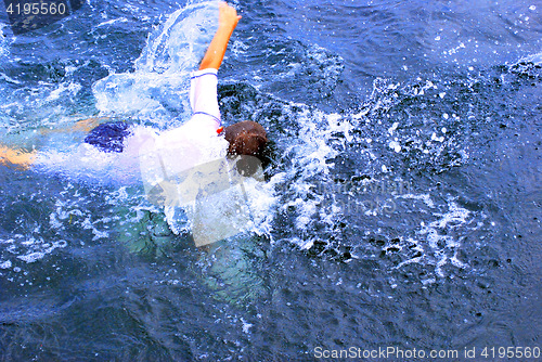 Image of Boy swimming.