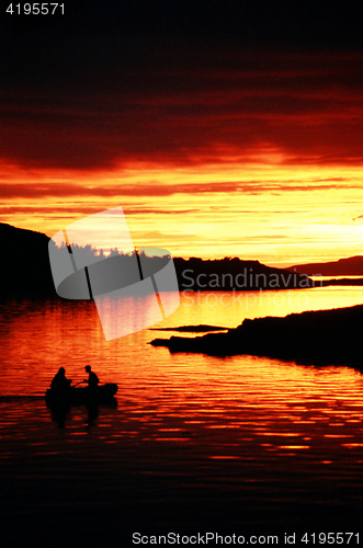 Image of Fishermen on the lake.