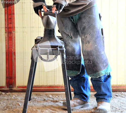 Image of Male farrier.