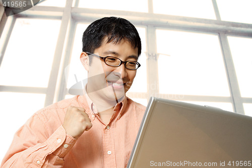 Image of Happy asian businessman