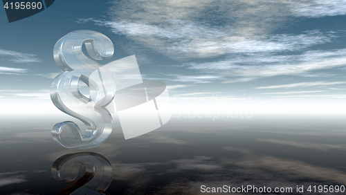 Image of glass paragraph symbol under cloudy sky - 3d rendering