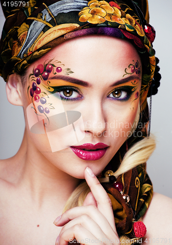Image of portrait of contemporary noblewoman with face art creative close up, russian style fashion