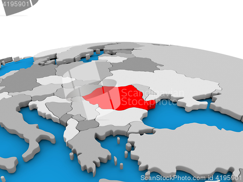 Image of Romania on globe in red